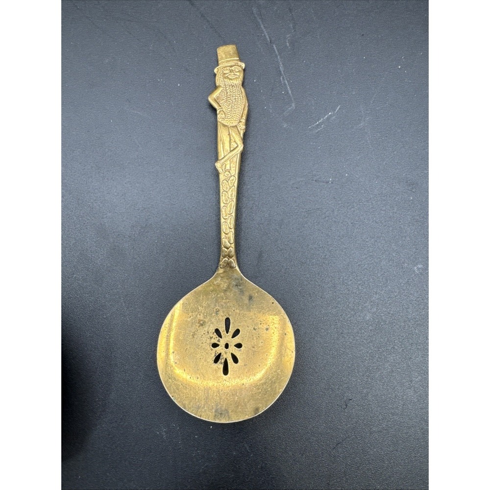 Vtg gold-toned Planters Mr Peanut advertising slotted serving spoon